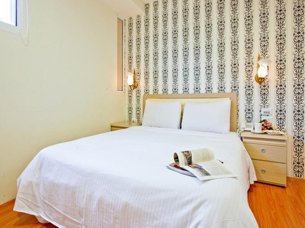Green Park Commercial Hotel Тайнан Стая снимка